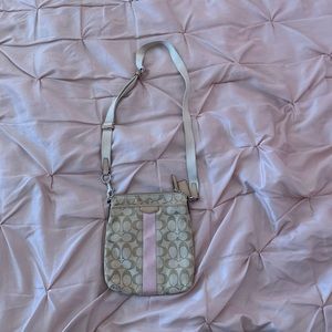 Coach tan crossbody with light pink stripe